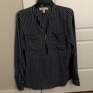 The blouse is from Michael Kors and it’s light and comfortable